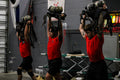 Firefighters performing overhead SCBA training indoors